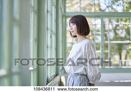 Stock Image - Young Japanese woman portrait. Fotosearch