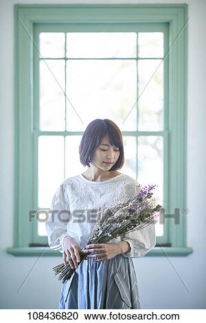 Young Japanese woman portrait View Large Photo Image Stock Image - Young Japanese woman portrait. Fotosearch