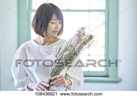 Young Japanese woman portrait View Large Photo Image Stock Image - Young Japanese woman portrait. Fotosearch