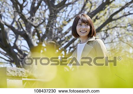 Young Japanese woman portrait View Large Photo Image Stock Image - Young Japanese woman portrait. Fotosearch