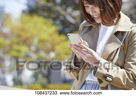Young Japanese woman portrait View Large Photo Image Stock Image - Young Japanese woman portrait. Fotosearch