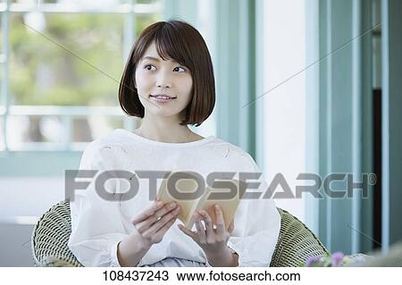 Stock Image - Young Japanese woman portrait. Fotosearch