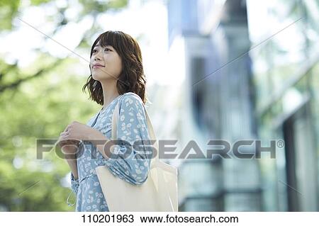 Young Japanese woman portrait View Large Photo Image Stock Image - Young Japanese woman portrait. Fotosearch