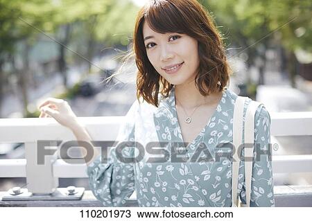 Young Japanese woman portrait View Large Photo Image Stock Image - Young Japanese woman portrait. Fotosearch