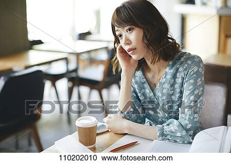 Stock Image - Young Japanese woman portrait. Fotosearch