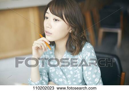 Young Japanese woman portrait View Large Photo Image Stock Image - Young Japanese woman portrait. Fotosearch