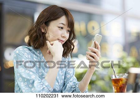 Young Japanese woman portrait View Large Photo Image Stock Image - Young Japanese woman portrait. Fotosearch