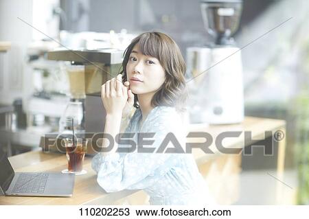 Young Japanese woman portrait View Large Photo Image Stock Image - Young Japanese woman portrait. Fotosearch