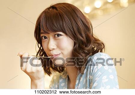 Young Japanese woman portrait View Large Photo Image Stock Image - Young Japanese woman portrait. Fotosearch
