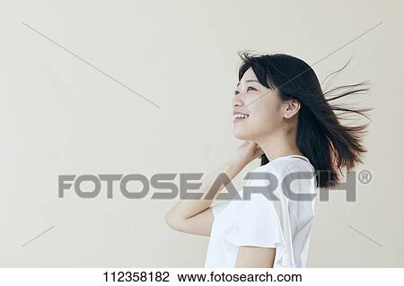 Young Japanese woman portrait View Large Photo Image Stock Image - Young Japanese woman portrait. Fotosearch