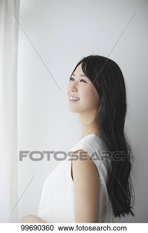 Stock Image - Young Japanese woman portrait. Fotosearch