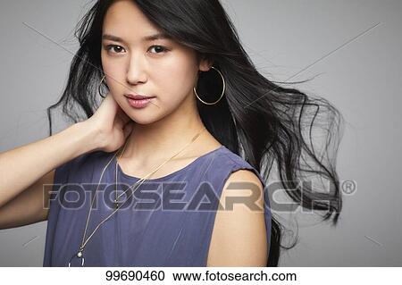 Young Japanese woman portrait View Large Photo Image Stock Image - Young Japanese woman portrait. Fotosearch