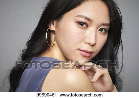 Young Japanese woman portrait View Large Photo Image Stock Image - Young Japanese woman portrait. Fotosearch