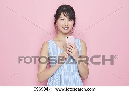 Young Japanese woman portrait View Large Photo Image Stock Image - Young Japanese woman portrait. Fotosearch