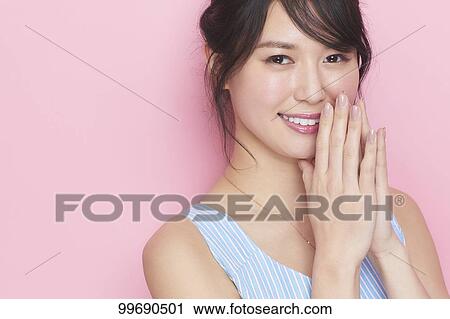 Stock Image - Young Japanese woman portrait. Fotosearch
