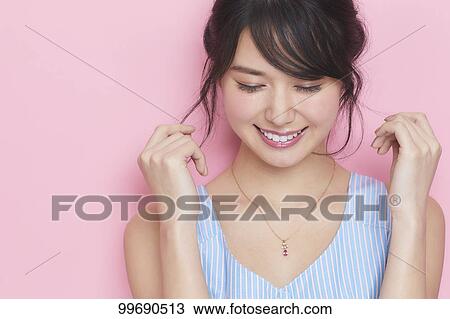 Young Japanese woman portrait View Large Photo Image Stock Image - Young Japanese woman portrait. Fotosearch