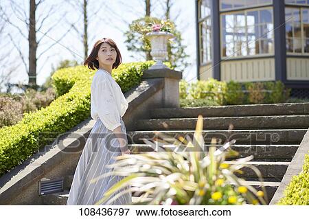 Young Japanese woman portrait View Large Photo Image Stock Photo - Young Japanese woman portrait. Fotosearch