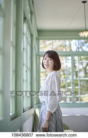 Young Japanese woman portrait View Large Photo Image Stock Photo - Young Japanese woman portrait. Fotosearch