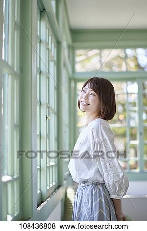 Young Japanese woman portrait View Large Photo Image Stock Photo - Young Japanese woman portrait. Fotosearch