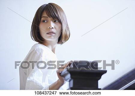 Young Japanese woman portrait View Large Photo Image Stock Photo - Young Japanese woman portrait. Fotosearch