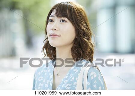 Young Japanese woman portrait View Large Photo Image Stock Photo - Young Japanese woman portrait. Fotosearch