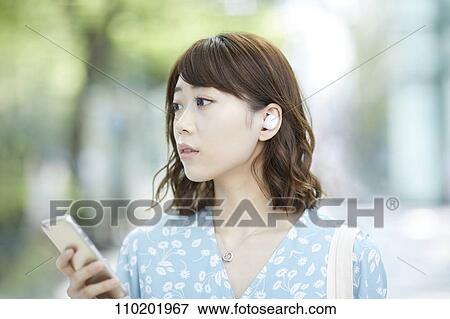 Young Japanese woman portrait View Large Photo Image Stock Photo - Young Japanese woman portrait. Fotosearch
