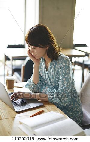 Stock Photo - Young Japanese woman portrait. Fotosearch