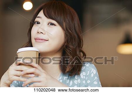 Stock Photo - Young Japanese woman portrait. Fotosearch