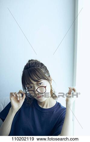 Stock Photo - Young Japanese woman portrait. Fotosearch