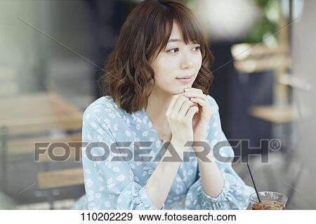 Young Japanese woman portrait View Large Photo Image Stock Photo - Young Japanese woman portrait. Fotosearch
