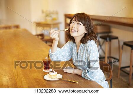 Young Japanese woman portrait View Large Photo Image Stock Photo - Young Japanese woman portrait. Fotosearch
