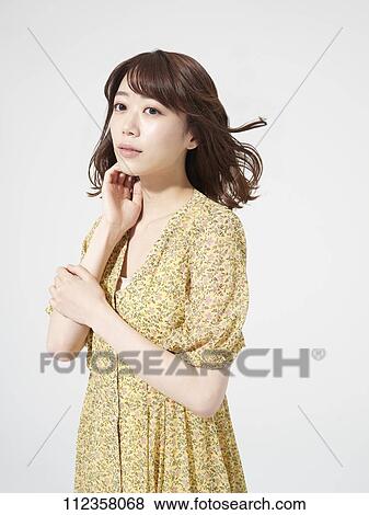 Young Japanese woman portrait View Large Photo Image Stock Photo - Young Japanese woman portrait. Fotosearch