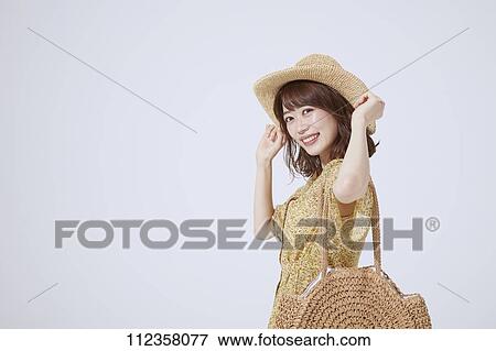 Stock Photo - Young Japanese woman portrait. Fotosearch