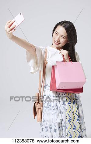 Young Japanese woman portrait View Large Photo Image Stock Photo - Young Japanese woman portrait. Fotosearch