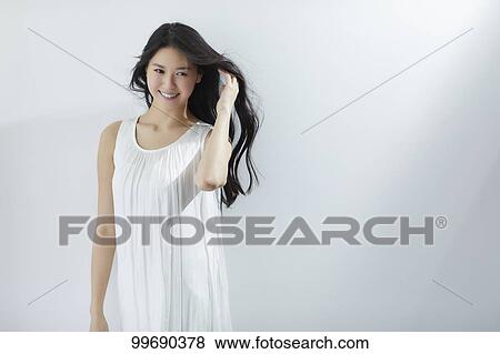 Stock Photo - Young Japanese woman portrait. Fotosearch
