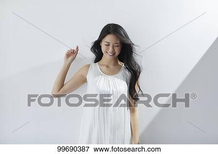 Young Japanese woman portrait View Large Photo Image Stock Photo - Young Japanese woman portrait. Fotosearch