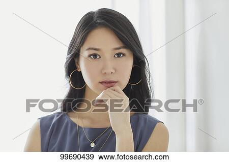 Young Japanese woman portrait View Large Photo Image Stock Photo - Young Japanese woman portrait. Fotosearch