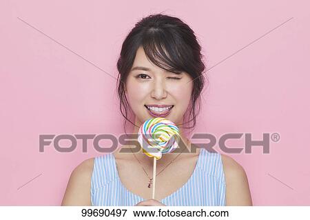Young Japanese woman portrait View Large Photo Image Stock Photo - Young Japanese woman portrait. Fotosearch