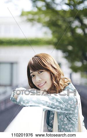 Young Japanese woman portrait View Large Photo Image Stock Photograph - Young Japanese woman portrait. Fotosearch