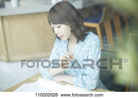 Stock Photograph - Young Japanese woman portrait. Fotosearch