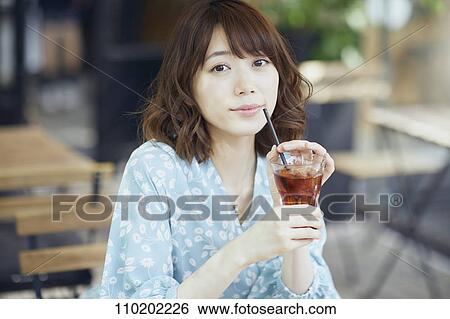 Young Japanese woman portrait View Large Photo Image Stock Photograph - Young Japanese woman portrait. Fotosearch