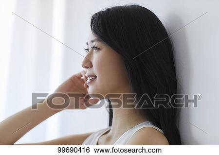 Young Japanese woman portrait View Large Photo Image Stock Photograph - Young Japanese woman portrait. Fotosearch