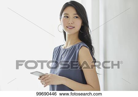 Stock Photograph - Young Japanese woman portrait. Fotosearch