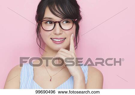 Young Japanese woman portrait View Large Photo Image Stock Photograph - Young Japanese woman portrait. Fotosearch
