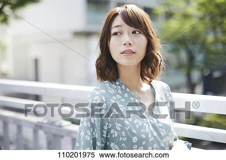 Young Japanese woman portrait View Large Photo Image Stock Photography - Young Japanese woman portrait. Fotosearch