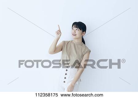 Young Japanese woman portrait View Large Photo Image Stock Photography - Young Japanese woman portrait. Fotosearch
