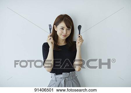 Stock Image - Young Japanese woman. Fotosearch