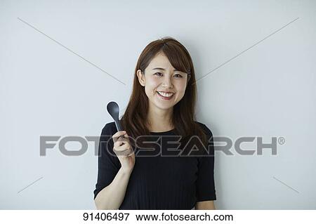 Young Japanese woman View Large Photo Image Stock Photo - Young Japanese woman. Fotosearch