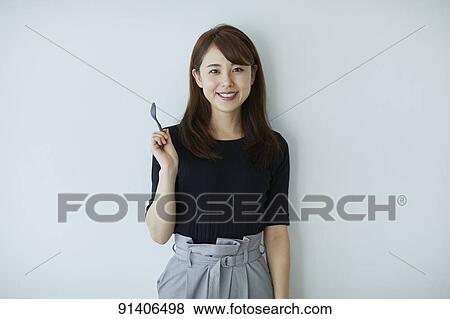 Stock Photo - Young Japanese woman. Fotosearch