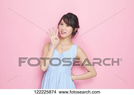 Picture - Young Japanese woman studio portrait. Fotosearch